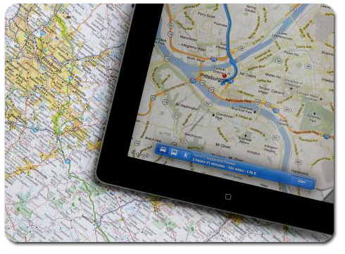 Tablet with GPS sitting on Map